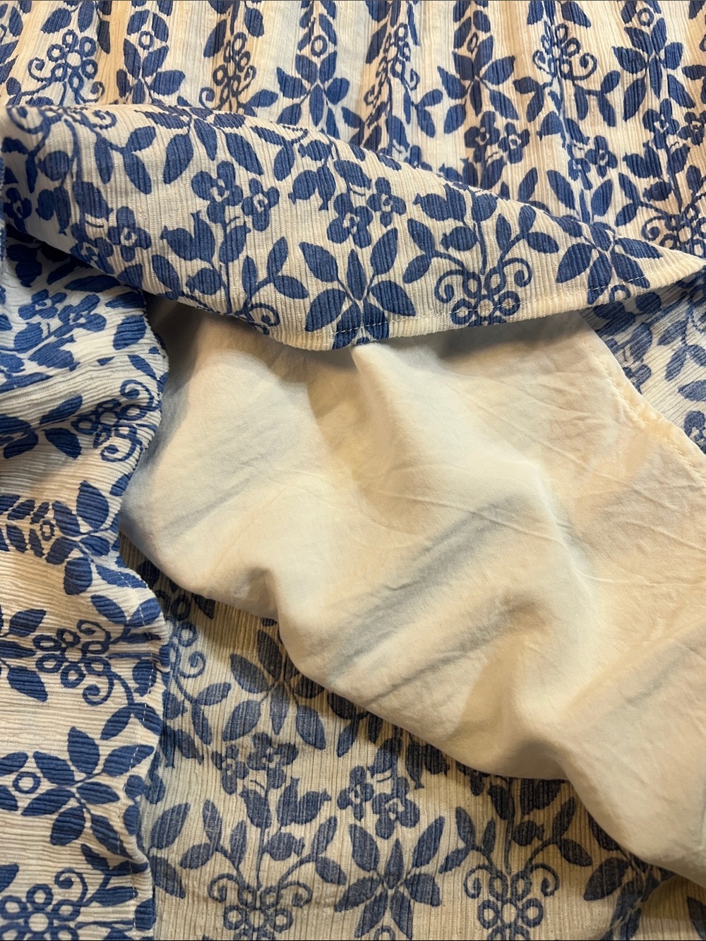 Skies Are Blue White and Blue Floral Smocked Blouse - Picture 6 of 6